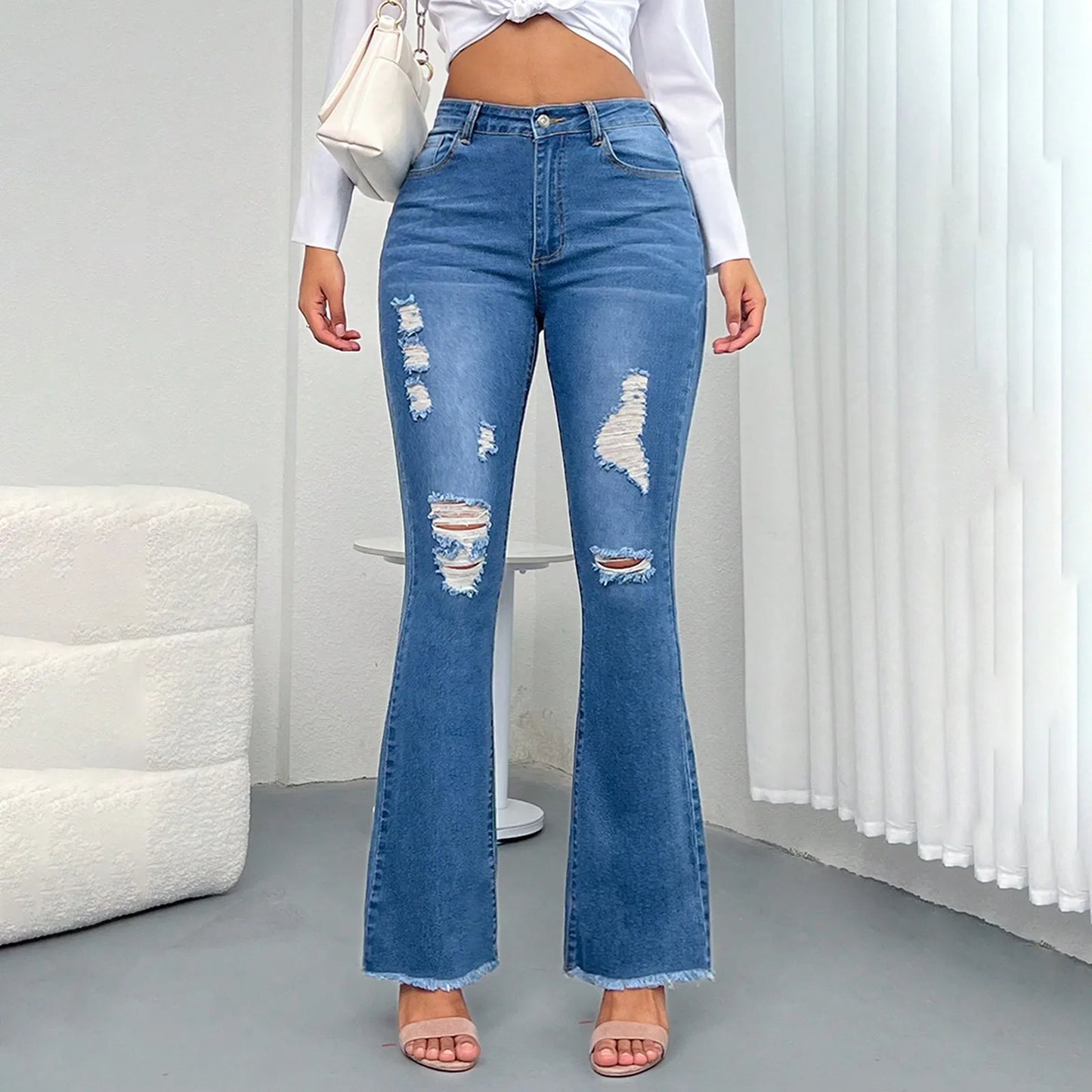 2025 New Spring Women's Ripped Jeans Cotton Slim High Waist Solid Color Sexy Denim Pants Fashion Street Flared Pants