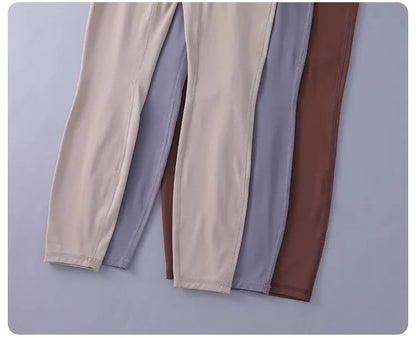 Women's high-waisted yoga pants with sculpting peach lift, buttery soft fabric for running and training.