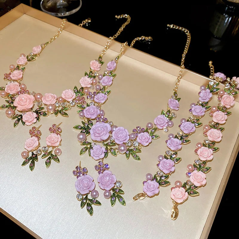 Flowers and leaves set with diamonds and pearl earrings and necklace set
