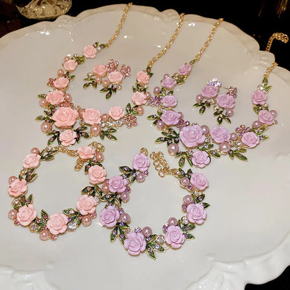 Flowers and leaves set with diamonds and pearl earrings and necklace set