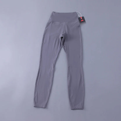 Women's high-waisted yoga pants with sculpting peach lift, buttery soft fabric for running and training.