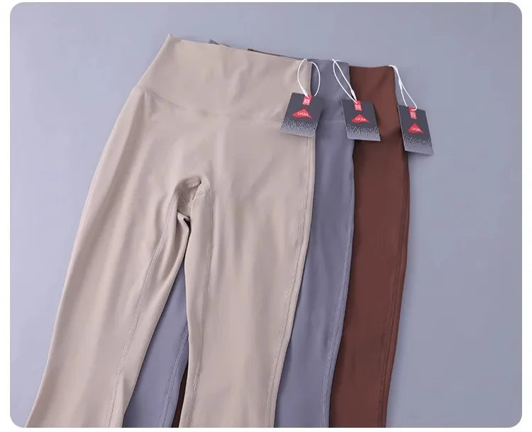 Women's high-waisted yoga pants with sculpting peach lift, buttery soft fabric for running and training.