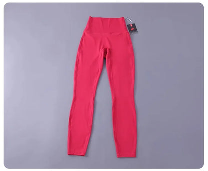 Women's high-waisted yoga pants with sculpting peach lift, buttery soft fabric for running and training.