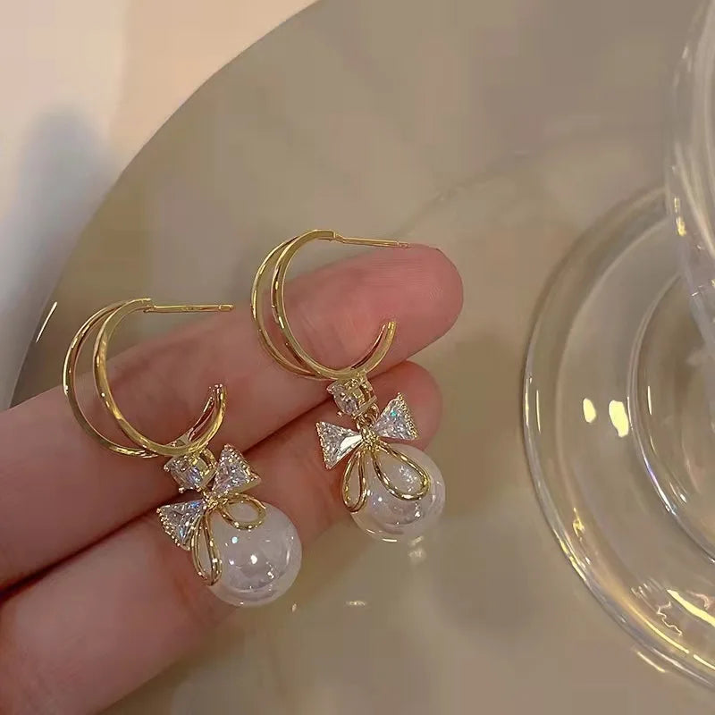 Sweet Earrings High End Feeling Pearl Bow Earrings Diamond Studded Earrings Fashionable Temperament Earrings And Earrings