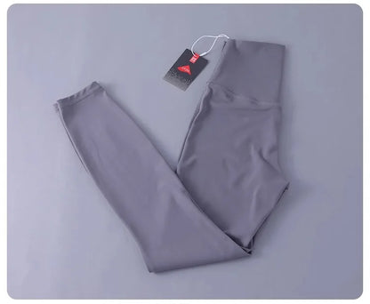 Women's high-waisted yoga pants with sculpting peach lift, buttery soft fabric for running and training.