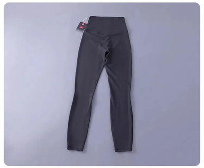 Women's high-waisted yoga pants with sculpting peach lift, buttery soft fabric for running and training.