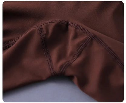 Women's high-waisted yoga pants with sculpting peach lift, buttery soft fabric for running and training.