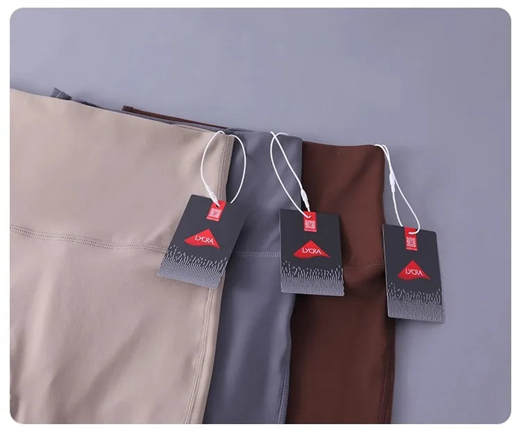 Women's high-waisted yoga pants with sculpting peach lift, buttery soft fabric for running and training.