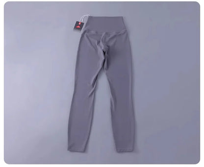 Women's high-waisted yoga pants with sculpting peach lift, buttery soft fabric for running and training.