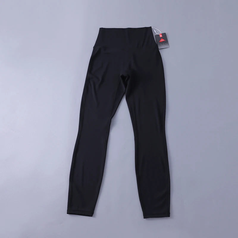 Women's high-waisted yoga pants with sculpting peach lift, buttery soft fabric for running and training.