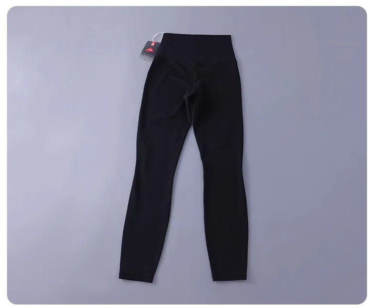 Women's high-waisted yoga pants with sculpting peach lift, buttery soft fabric for running and training.