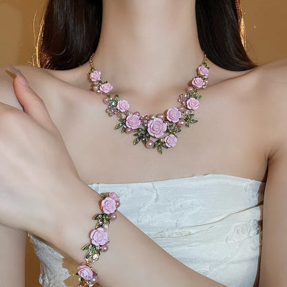 Flowers and leaves set with diamonds and pearl earrings and necklace set
