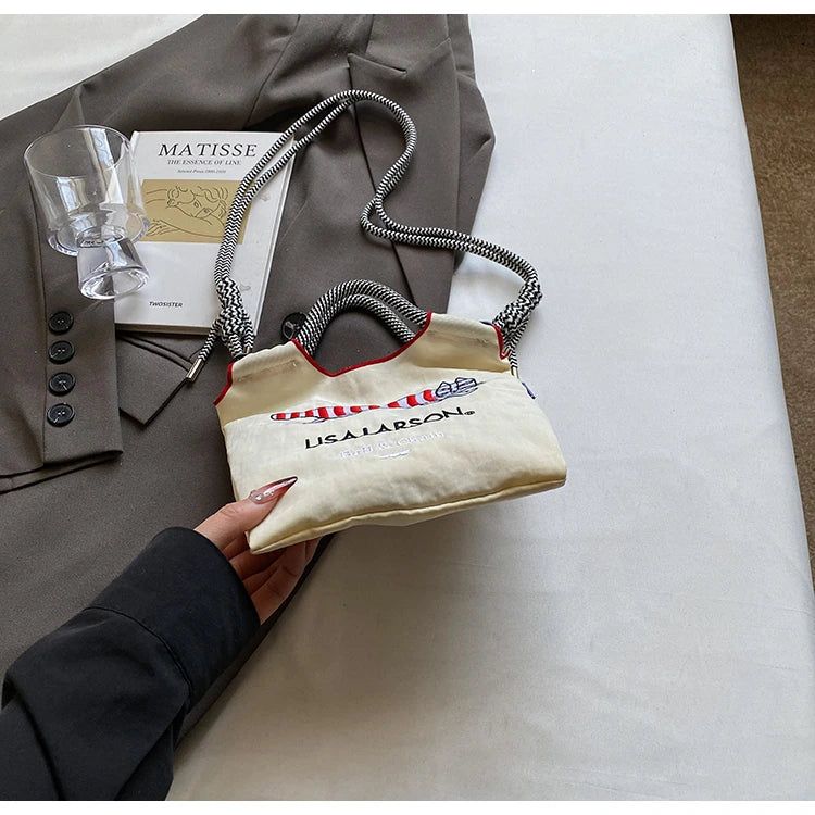 Embroidered canvas bag for women; light single shoulder bag for spring and summer; cross-body handbag.