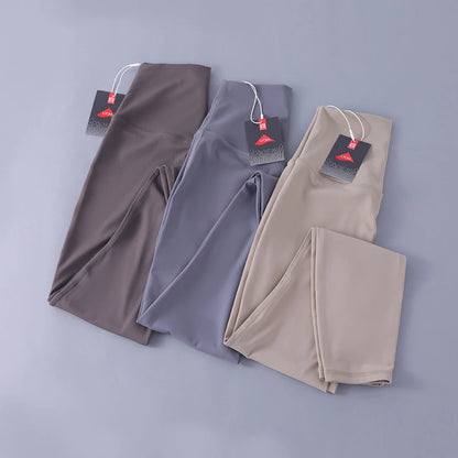 Women's high-waisted yoga pants with sculpting peach lift, buttery soft fabric for running and training.