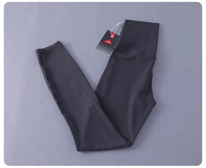 Women's high-waisted yoga pants with sculpting peach lift, buttery soft fabric for running and training.