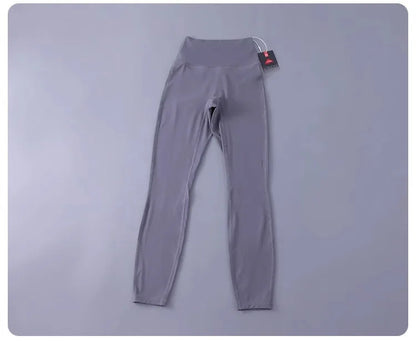 Women's high-waisted yoga pants with sculpting peach lift, buttery soft fabric for running and training.