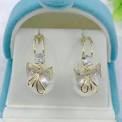 Sweet Earrings High End Feeling Pearl Bow Earrings Diamond Studded Earrings Fashionable Temperament Earrings And Earrings
