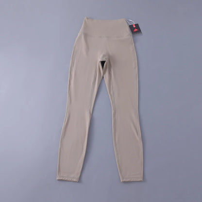 Women's high-waisted yoga pants with sculpting peach lift, buttery soft fabric for running and training.