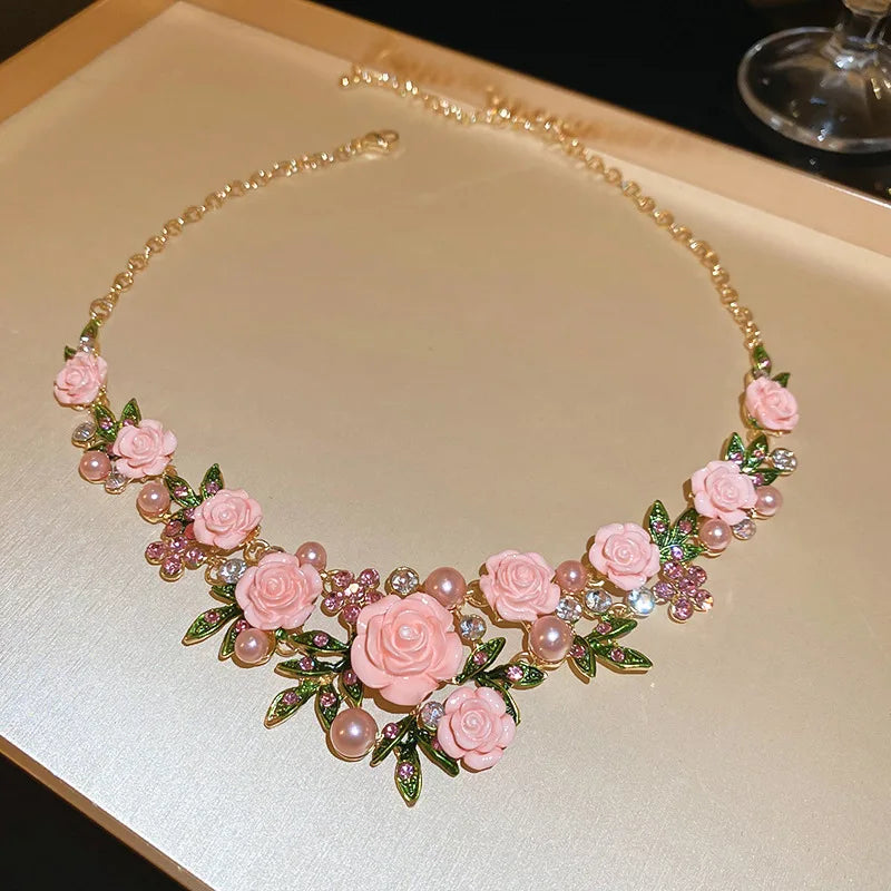 Flowers and leaves set with diamonds and pearl earrings and necklace set